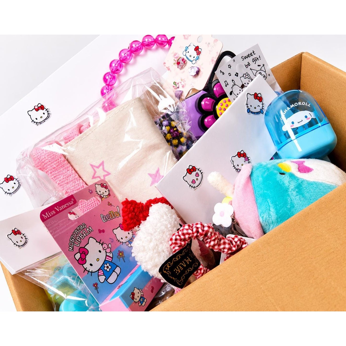 Hello Kitty & Friends 13-Piece Gift Bundle | Tote Bag, Mini Lunchbox, Hair Claws, Pen, Earrings, Sanrio Gift Set