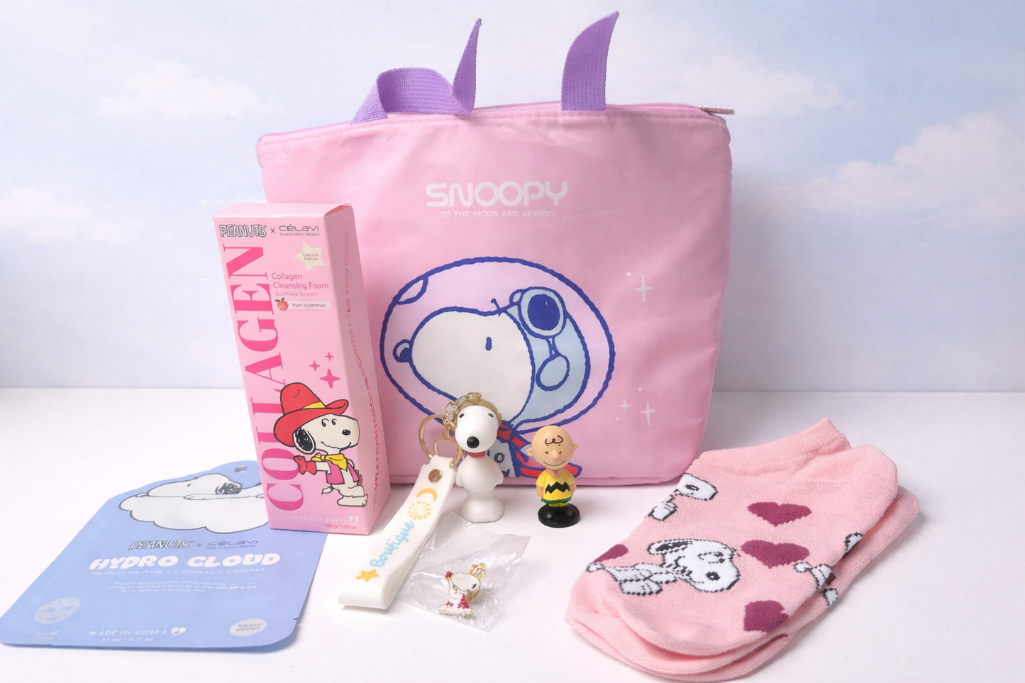 Snoopy Gift Set Bundle 7 Piece Peanuts Skincare and Accessories Set with MINISO Tote Celavi Face Wash Sheet Mask Socks Keychain Charlie Brown Figure